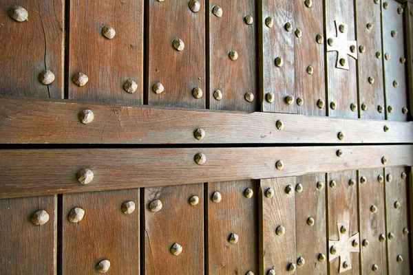 Blur lombardy   arsago   curch  closed wood    cross — Stock Photo, Image