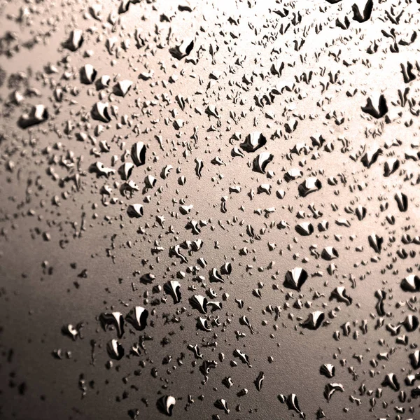 Em um carro após a chuva várias gotas de água — Fotografia de Stock