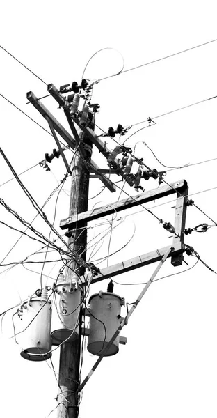 A electric pole with transformer and wire  the cloudy sky — Stock Photo, Image