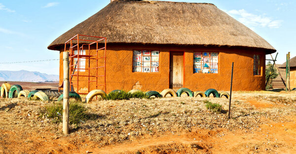  in lesotho  street village near   mountain  