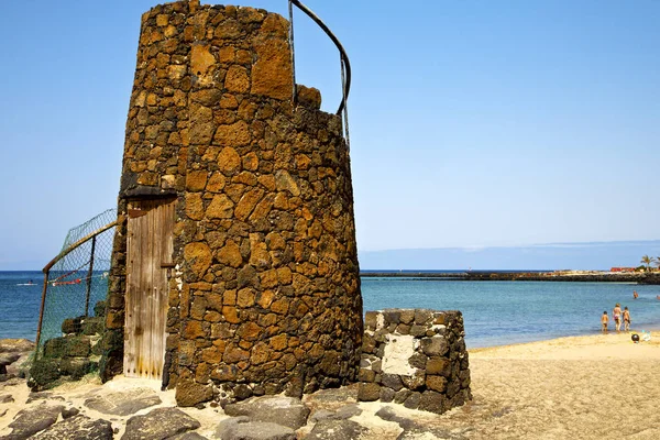 Tower s    black rocks   lanzarote — Stock Photo, Image