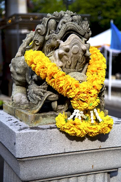 demon statue in temple in bangkok, thailand