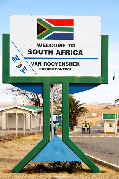 У Південній Африці кордону сигналу Ласкаво просимо концепції контролю — стокове фото