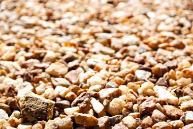 Güney Afrika'da plaja yakın taş taş yakın çekim ve ışık bulanıklık