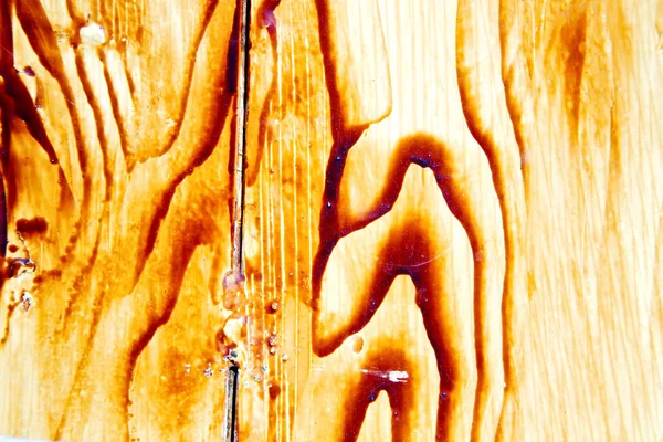 Pintura despojada a porta de madeira marrom e amarelo enferrujado — Fotografia de Stock