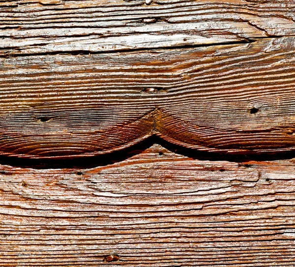 В домашней текстуре деревянной двери и гвоздя — стоковое фото