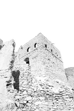 Umman eski köy evi ve bulutlu gökyüzü terk