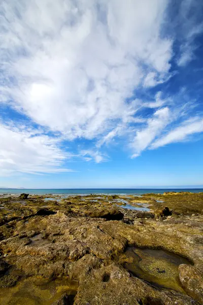 Luz playa agua espuma roca españa paisaje cielo nube —  Fotos de Stock