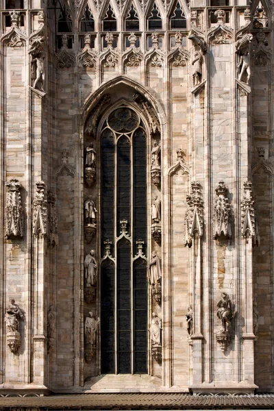 Italy church  rose window  the front of the duomo    column — Stock Photo, Image