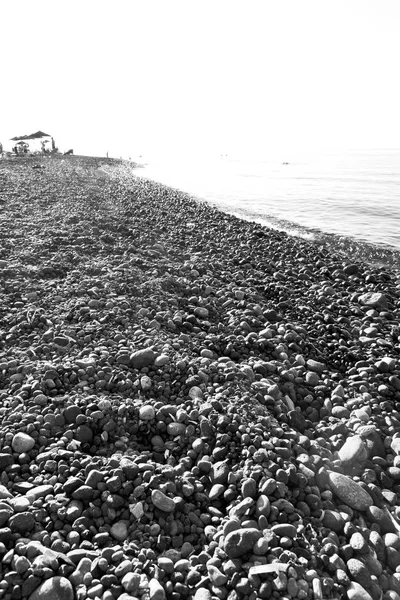 Mar de rocha e praia na europa grécia a ilha de mykonos — Fotografia de Stock