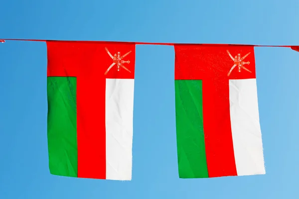 In oman waving flag and the cloudy sky — Stock Photo, Image