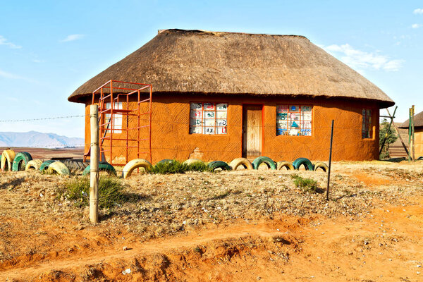  in lesotho  street village near   mountain  