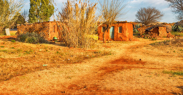 Blur in lesotho malealea street village near mountain and coultivation field