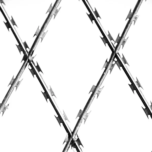 Abstract razor wire in the clear sky — Stock Photo, Image