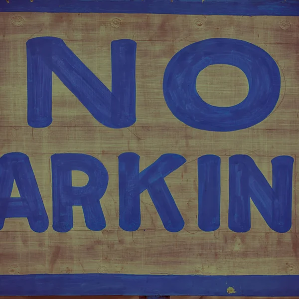 Gamla smutsiga etikett parkering signal — Stockfoto