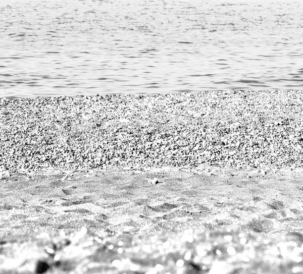 Rock sea     and     beach   in europe greece the mykonos island — Stock Photo, Image