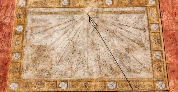 In italy sundial and   antique  wall — Stock Photo, Image