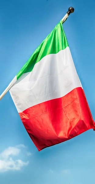 Italian waving flag in the free sky — Stock Photo, Image