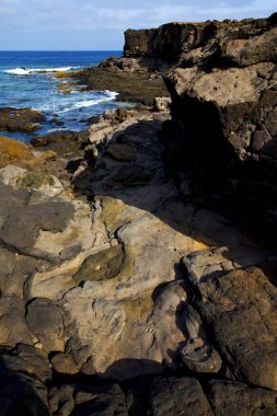 Plaj ışık su lanzarote Adası köpük rock taş gökyüzü c