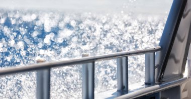 Avustralya parmaklıklar tekne ve okyanus gelen ışık bokeh