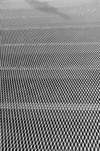 Abstracte textuur achtergrond van een raster metaaloppervlak — Stockfoto