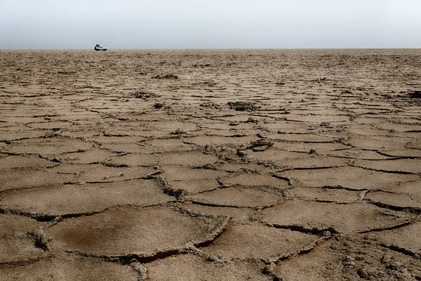 砂漠の抽象的な背景テクスチャひび割れ乾燥地 — ストック写真
