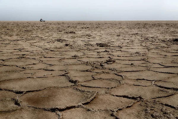 沙漠裂开干燥地面的抽象背景纹理 — 图库照片