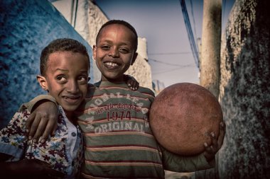 ETHIOPIA,LALIBELA-CIRCA  JANUARY 2018--unidentified children and a ball concept of  friendship clipart