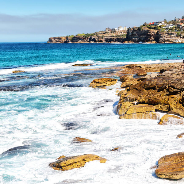 in  australia  sydney the bay the rock and the ocean near bondi beach
