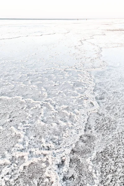 Afryka w Etiopii zachód słońca odbitego w salt lake — Zdjęcie stockowe