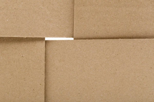 Cardboard on the white background — Stock Photo, Image