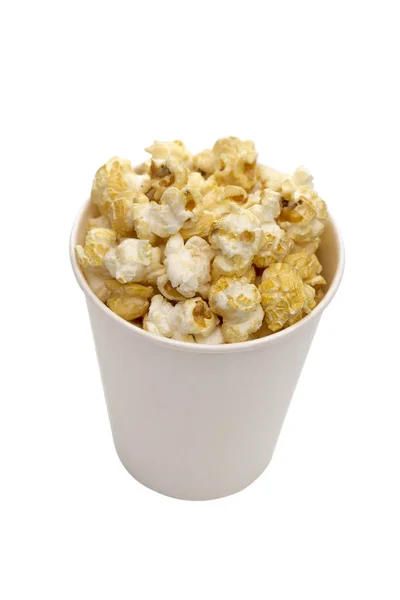 Popcorn på den vita bakgrunden — Stockfoto