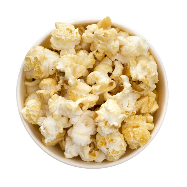 Popcorn på den vita bakgrunden — Stockfoto