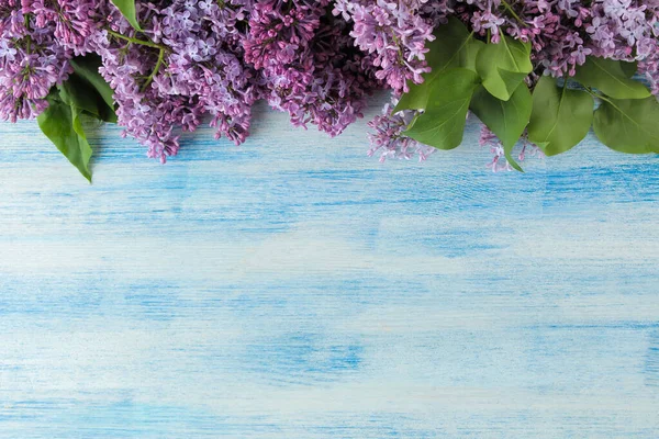 Spring Flowers Frame Twigs Blooming Lilac Blue Wooden Table Top Royalty Free Stock Images