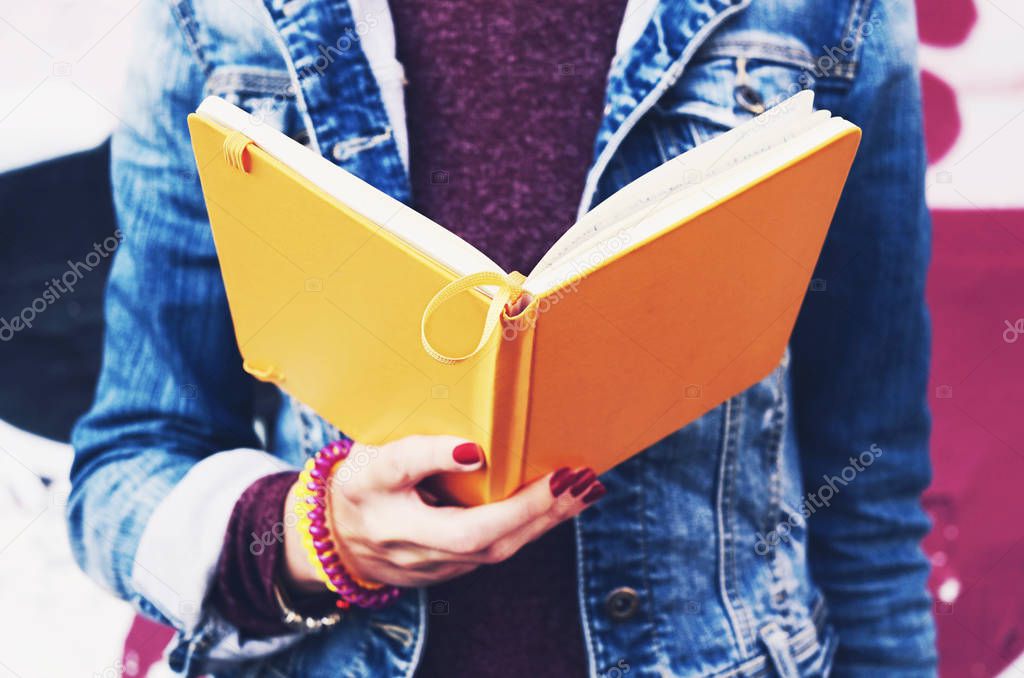 Student reading open copybook