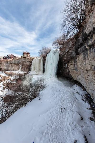 A large frozen waterfall. 3 cascading waterfall in Dagestan