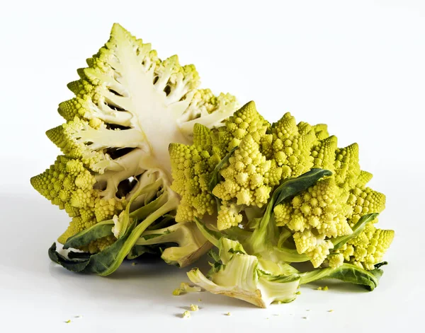 A halved Romanesco broccoli on a white background — Stock Photo, Image