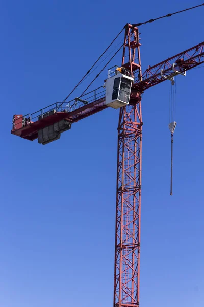 High construction crane on blue sky — Stock Photo, Image