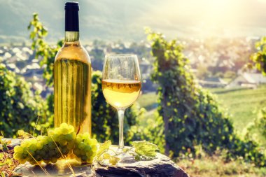 Bottle and glass of white wine clipart