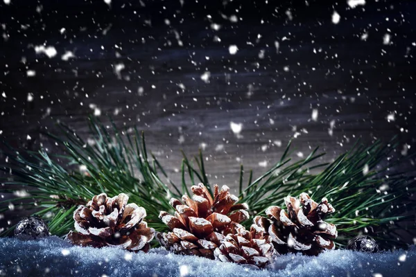 Christmas holiday setting with pine cones — Stock Photo, Image