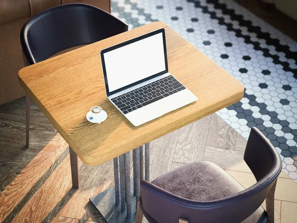 Portatile con schermo bianco su un tavolino da caffè. rendering 3d — Foto Stock