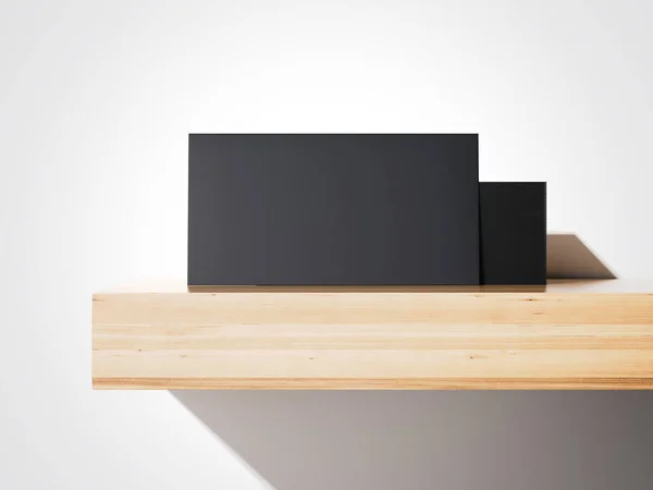 Stapel schwarzer Visitenkarten in einem Regal. 3D-Darstellung — Stockfoto