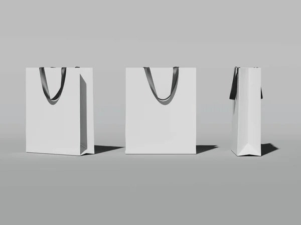 Three white shopping bags. 3d rendering — Stock Photo, Image