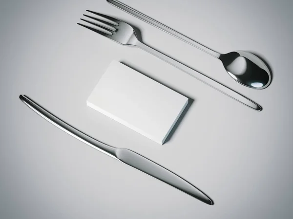 Messer, Gabel und Löffel mit Visitenkarten. 3D-Darstellung — Stockfoto