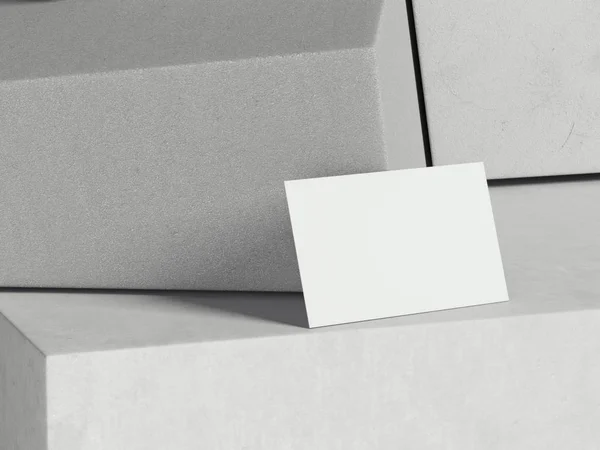 Λευκή επαγγελματική κάρτα στο πέτρινο κύβους. 3D rendering — Φωτογραφία Αρχείου