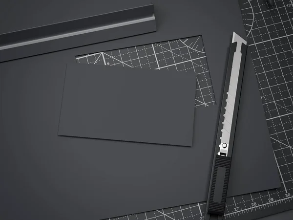 Mesa de corte de oficina y tarjeta de visita negra de papel. renderizado 3d — Foto de Stock
