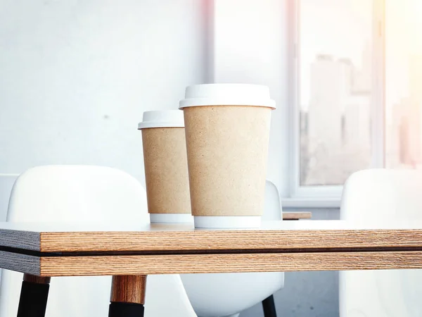 Стол в ресторане с двумя чашками кофе. 3d-рендеринг — стоковое фото