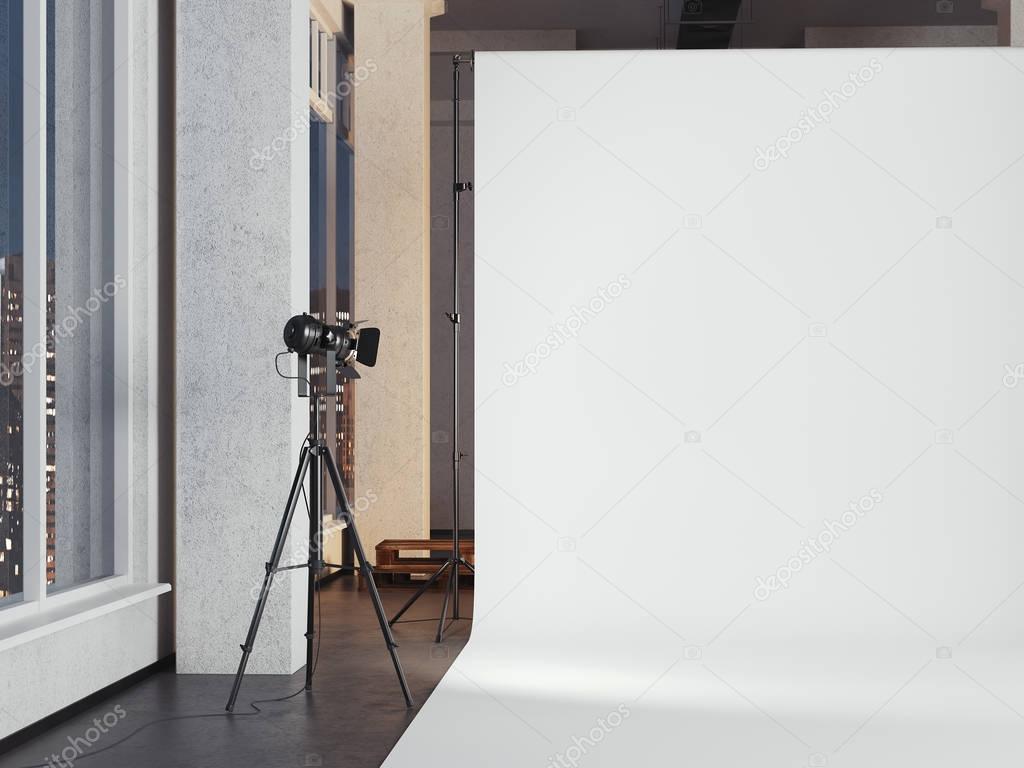 Modern photo studio with blank white background. 3d rendering