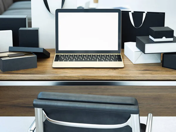 Bureau met laptop en vele geschenken. Online winkelen concept. 3D-rendering — Stockfoto