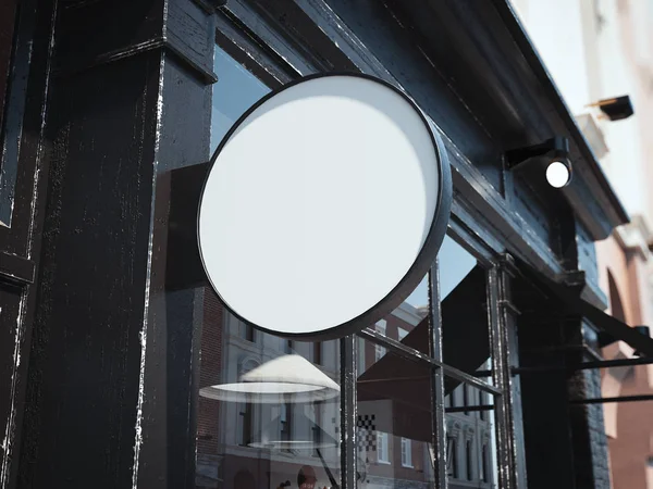 Черная круглая вывеска на стене входа в бар. 3d-рендеринг — стоковое фото